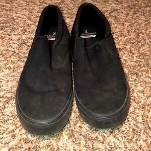 Men size 9 black canvas slip on shoes.